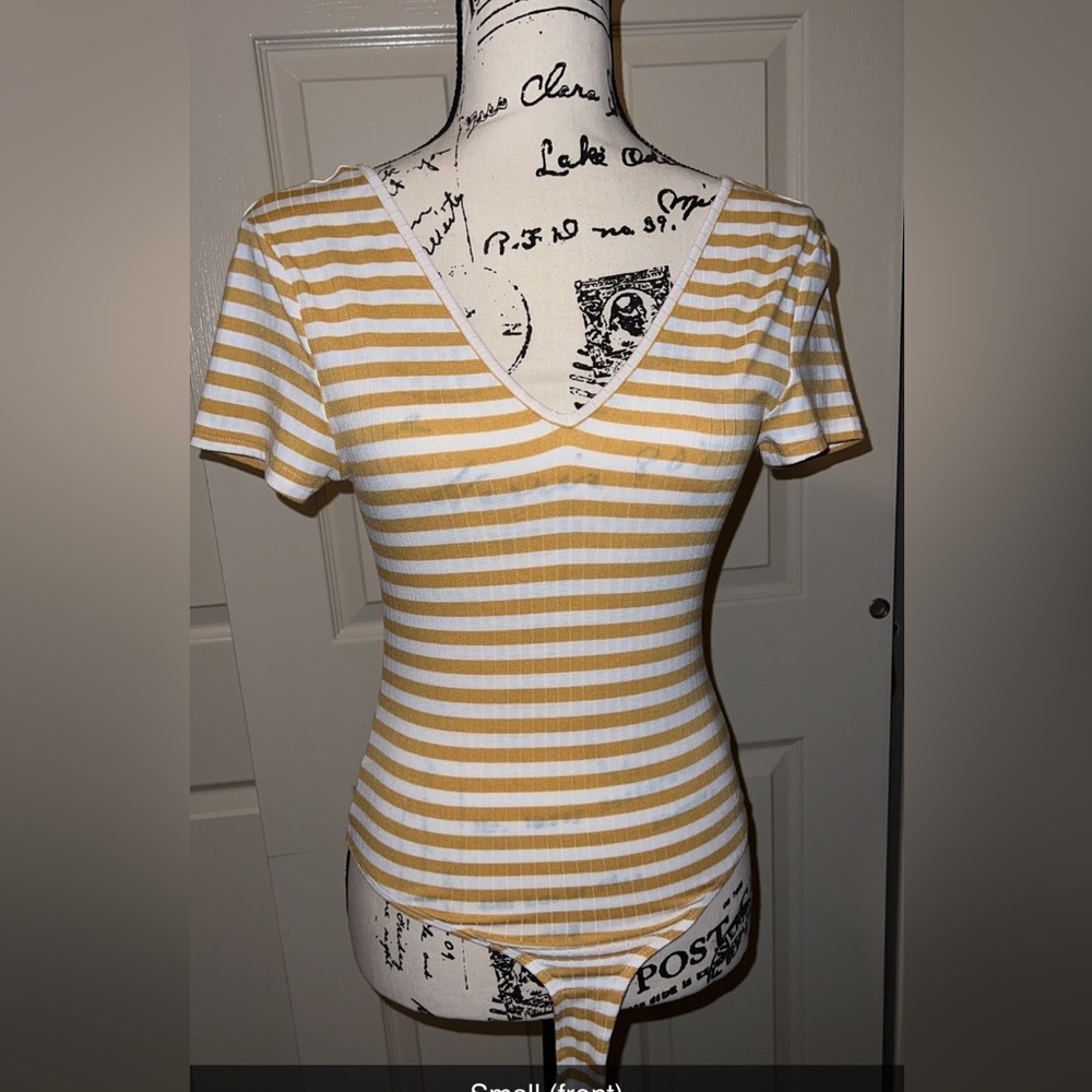 Yellow bodysuit!